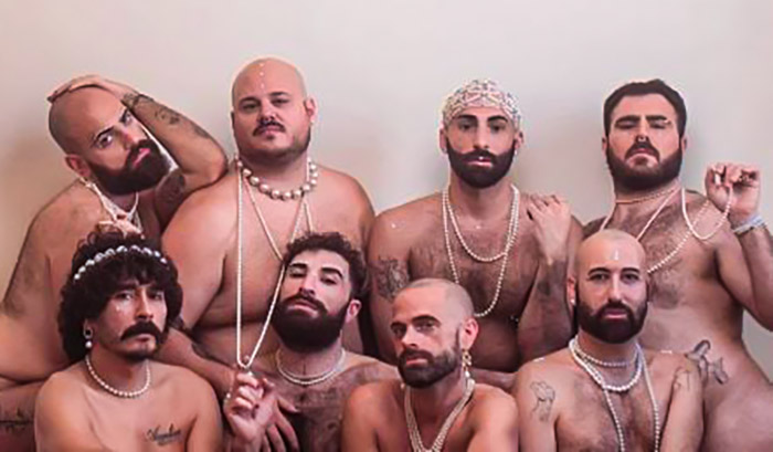 A lean, muscular frame adorned with a glorious mane of body hair